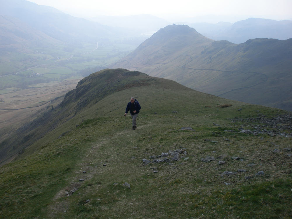 Coming up Steel Fell with Helm Crag behind